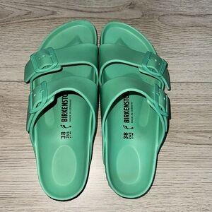 Mint green Arizona Essentials Birkenstock sandals